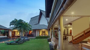 A modern villa with a swimming pool, outdoor seating, and a well-maintained lawn. - Beautiful Villa With Private Pool, Bali Villa 2017 (Seminyak)