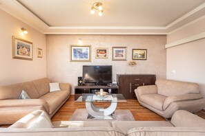 House (Four Bedroom Holiday Home with Pool) | Living room | Flat-screen TV, DVD player