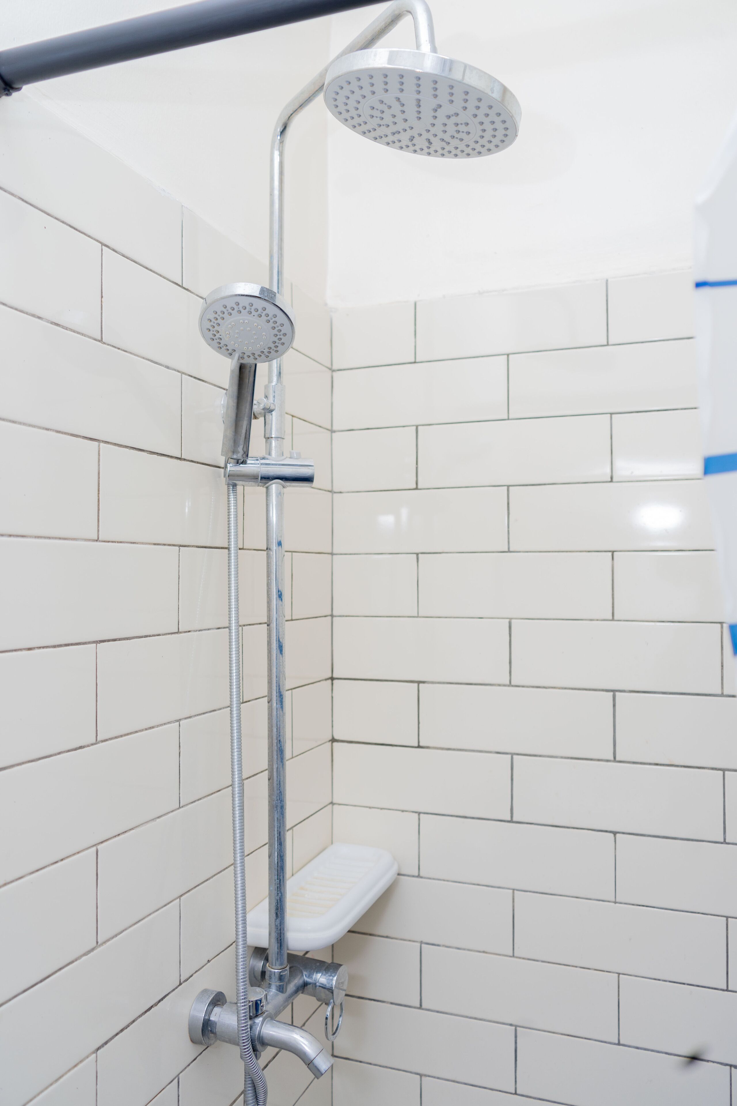 Bathtub, towels, soap, toilet paper