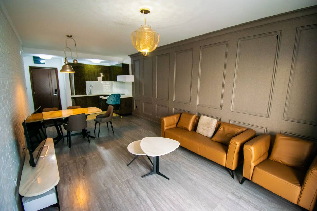 Appartement Luxe, 1 chambre, cuisine, vue plage | Coin séjour