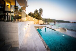 Seasonal outdoor pool, pool umbrellas, sun loungers