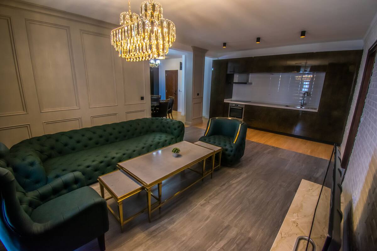 Deluxe Apartment, Kitchen, Beach View | Living area