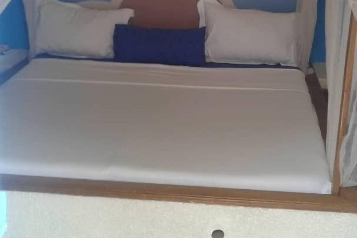 Desk, laptop workspace, blackout curtains, free cots/infant beds