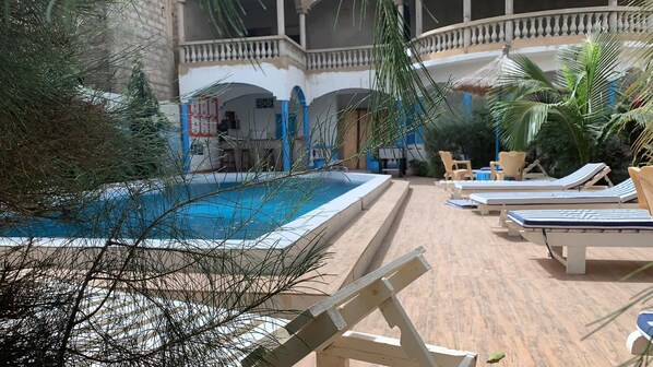 Outdoor pool, pool loungers