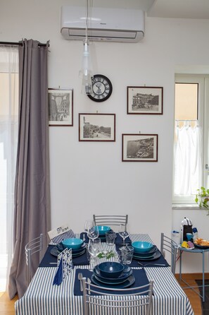 Enjoy a romantic meal for two in this stylish dining area, complete with a beautifully set table and a lovely view.