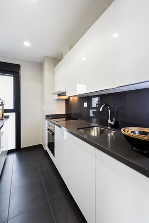 Apartment, 2 Bedrooms | Private kitchen | Full-size fridge, microwave, oven, stovetop