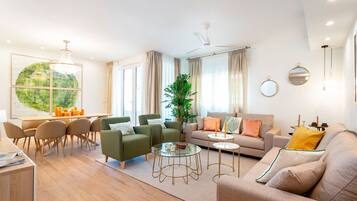 Apartment (5 Bedrooms) | Living area | 32-inch TV with cable channels