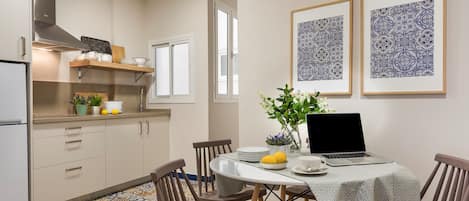 Apartment, 2 Bedrooms | Private kitchen | Full-size fridge, microwave, stovetop, coffee/tea maker