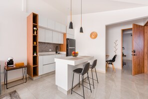 Microwave, stovetop, espresso maker, coffee/tea maker - C A L Suites (Cali)