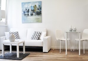 Apartment, 1 Bedroom | Living area | Flat-screen TV