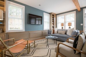 Smart TV, fireplace, books