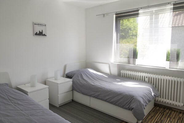 Apartemen, 2 kamar tidur | 2 kamar tidur, setrika/meja setrika, Wi-Fi gratis, dan seprai linen