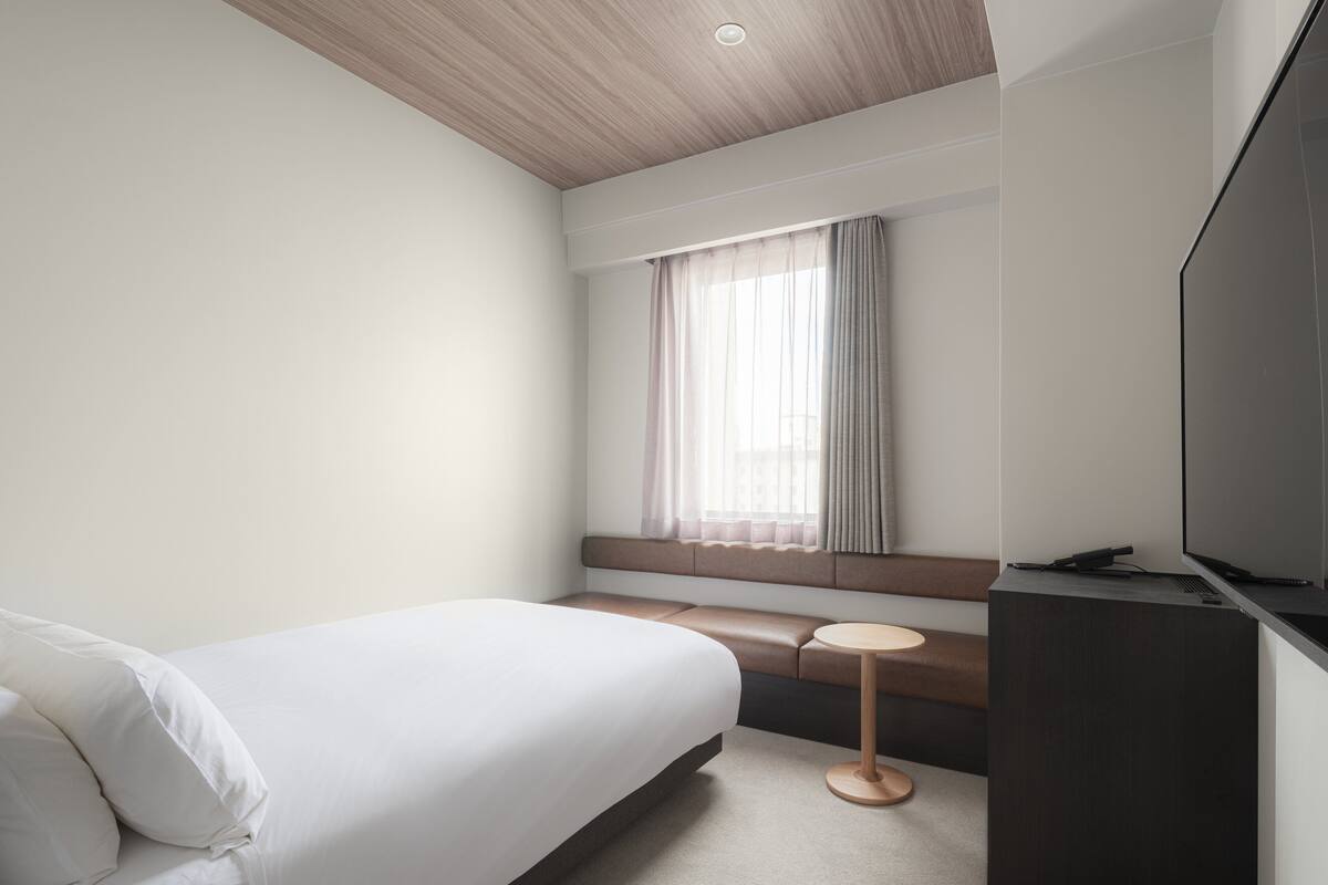 Down duvets, pillow-top beds, in-room safe