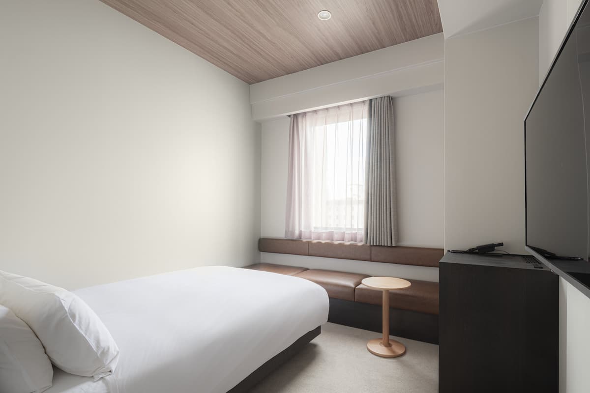 Donzen dekbedden, pillowtop-bedden, een kluis op de kamer