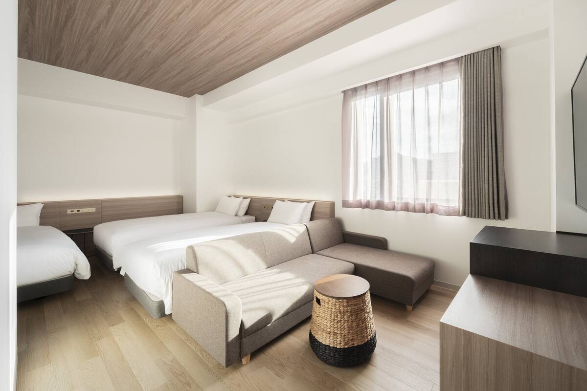 Quadruple Room, Non Smoking (28 sqm) | Down duvets, pillow-top beds, in-room safe