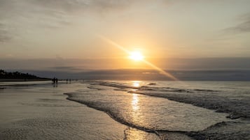 On the beach, sun loungers