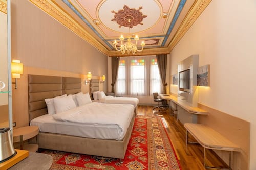 Habitación triple Deluxe | Sábanas de algodón egipcio, ropa de cama de alta calidad y edredón