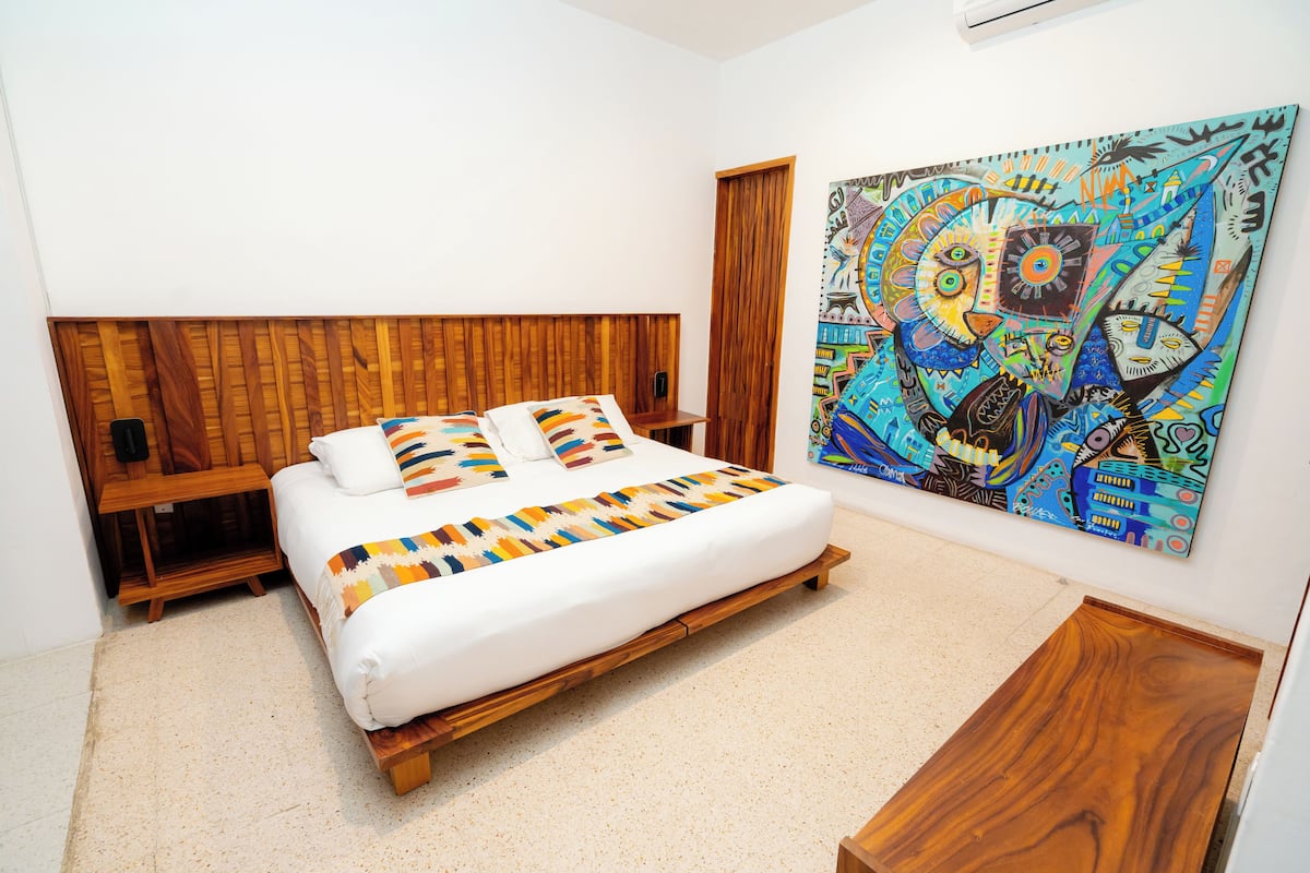 Deluxe Room, 1 King Bed, Hot Tub (Macuil) | 1 bedroom, minibar, in-room safe, desk