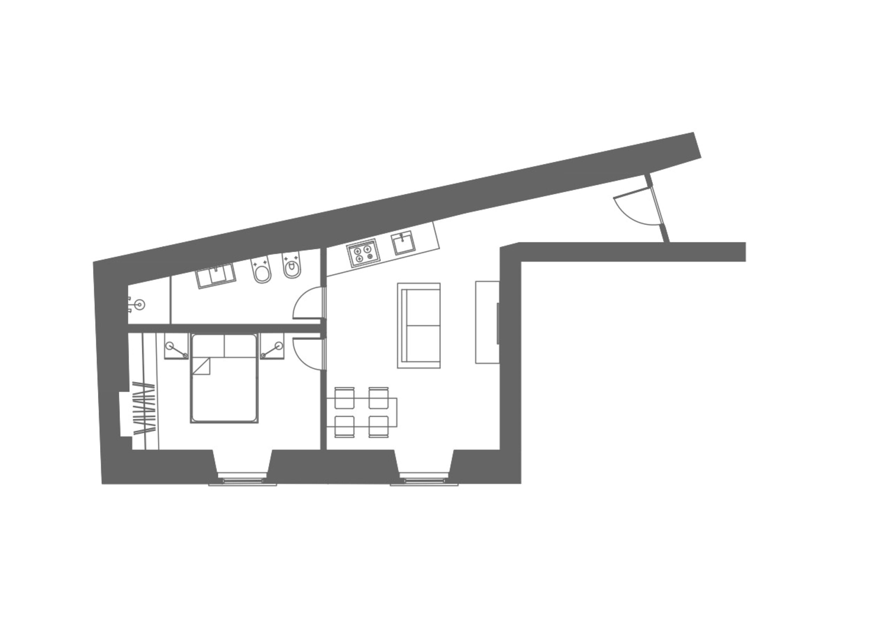 Un plan d’étage d’une maison comprenant une cuisine, un coin repas et deux chambres.