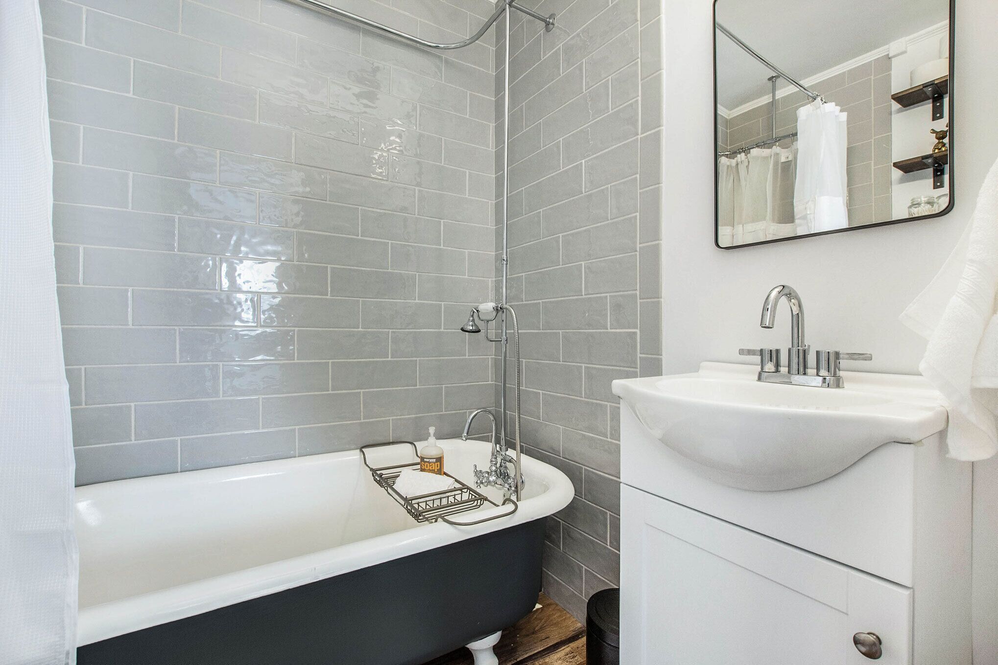 Combined shower/tub, hair dryer, towels, soap