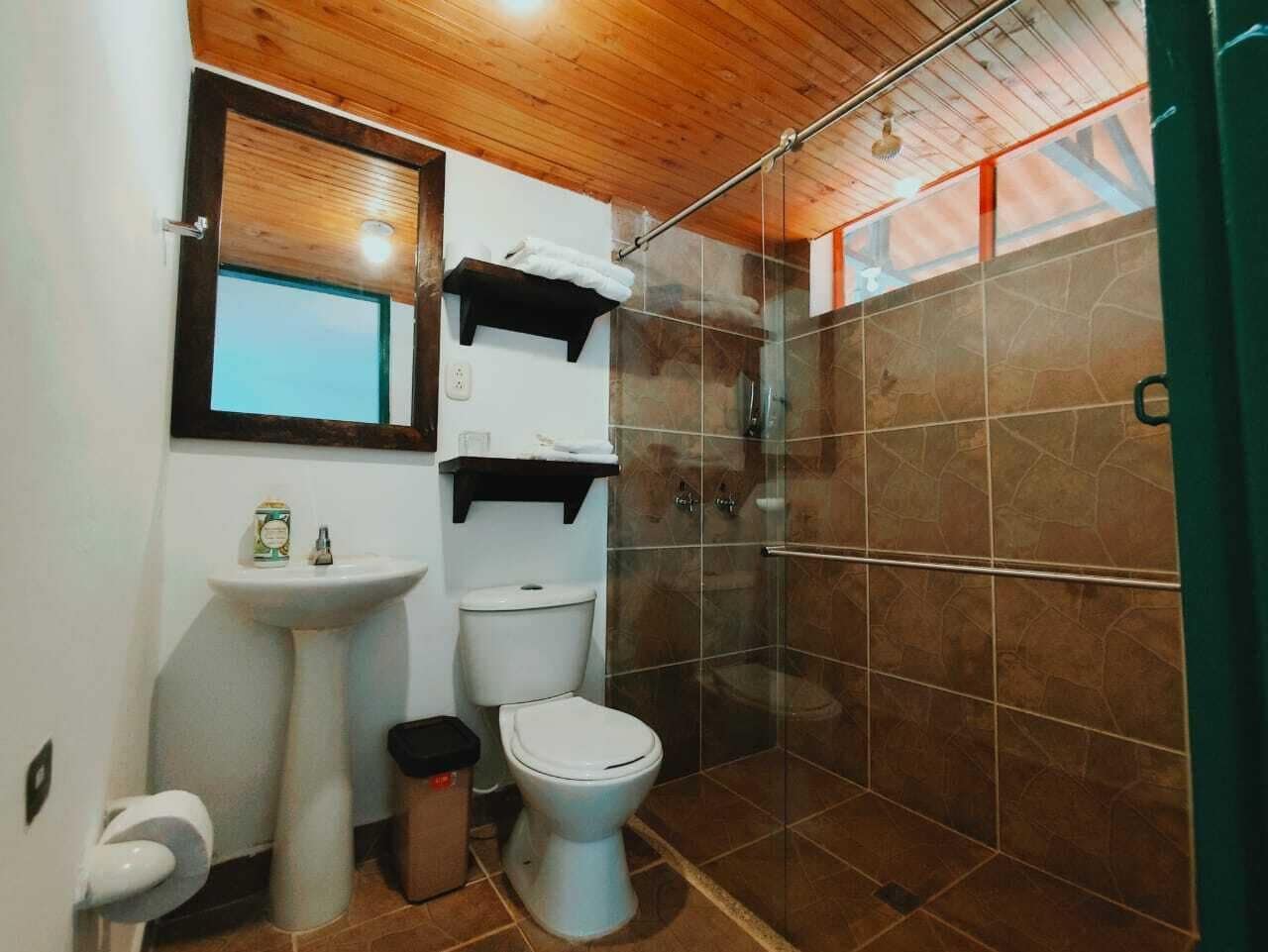 classic double room | bathroom | shower, rainfall showerhead, hair dryer, towels