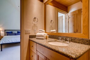 Bathtub, hair dryer, towels