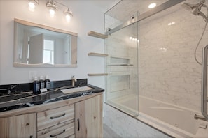 Bathtub, hair dryer, towels
