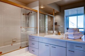 Bathtub, hair dryer, towels