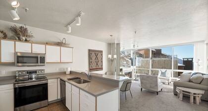 Ski in/Ski Out to Snowbird in this Delightful Condominium with Fireplace