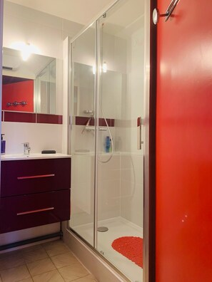 Shower, hair dryer, soap, shampoo