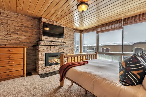 Updated Condominium with Fireplace, Wine Fridge and Granite Countertops