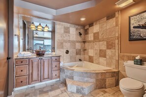 Bathtub, hair dryer, towels