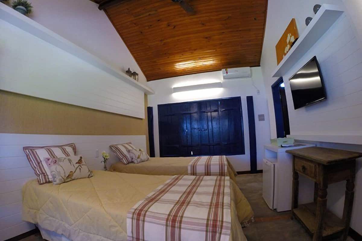 Double Room | Minibar, blackout drapes, WiFi (free), bed sheets