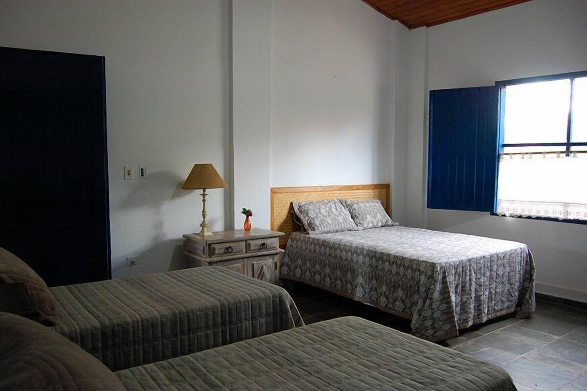 Quadruple Room | Minibar, blackout drapes, WiFi (free), bed sheets
