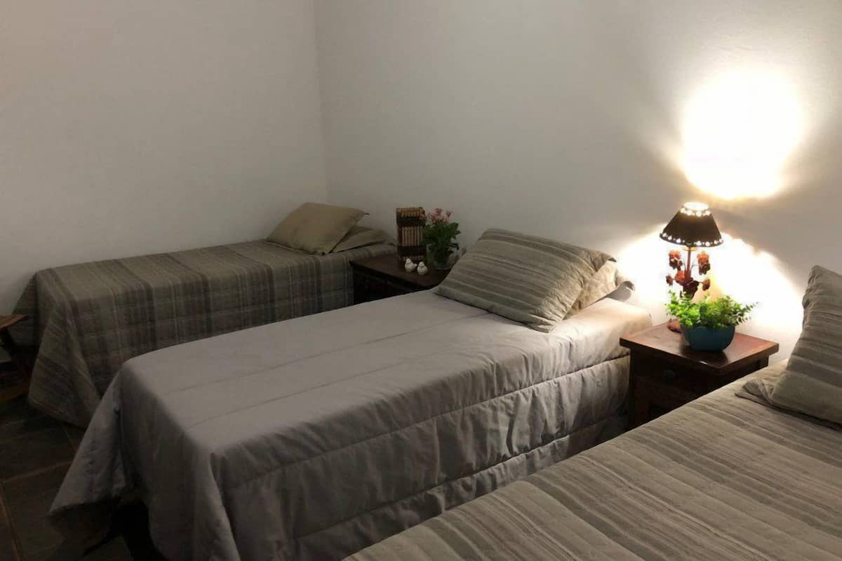 Triple Room | Minibar, blackout drapes, WiFi (free), bed sheets