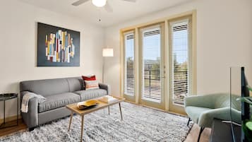 Family Apartment, 2 Bedrooms, 2 Bathrooms (Self Check-in with Virtual Front Desk) | Living room | 49-inch Smart TV with digital channels, TV, Netflix