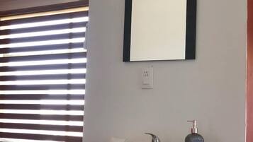 Shower, towels, soap, toilet paper