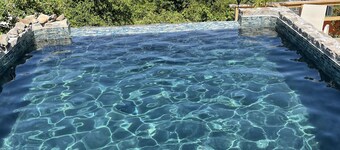 Colorful Caribbean Cottage • King Bed, Pool, Lush Garden Views