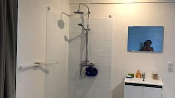 Shower, free toiletries, hair dryer, towels
