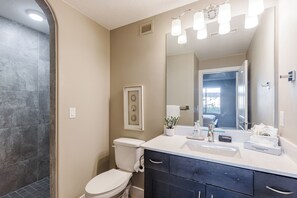 Bathtub, hair dryer, towels
