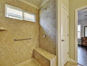 Combined shower/tub, hair dryer, towels, soap