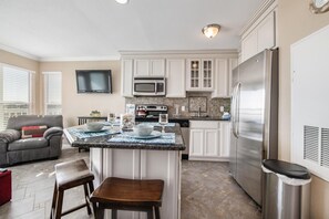 Family Condo, 2 Bedrooms | Private kitchen | Full-sized fridge, microwave, oven, stovetop