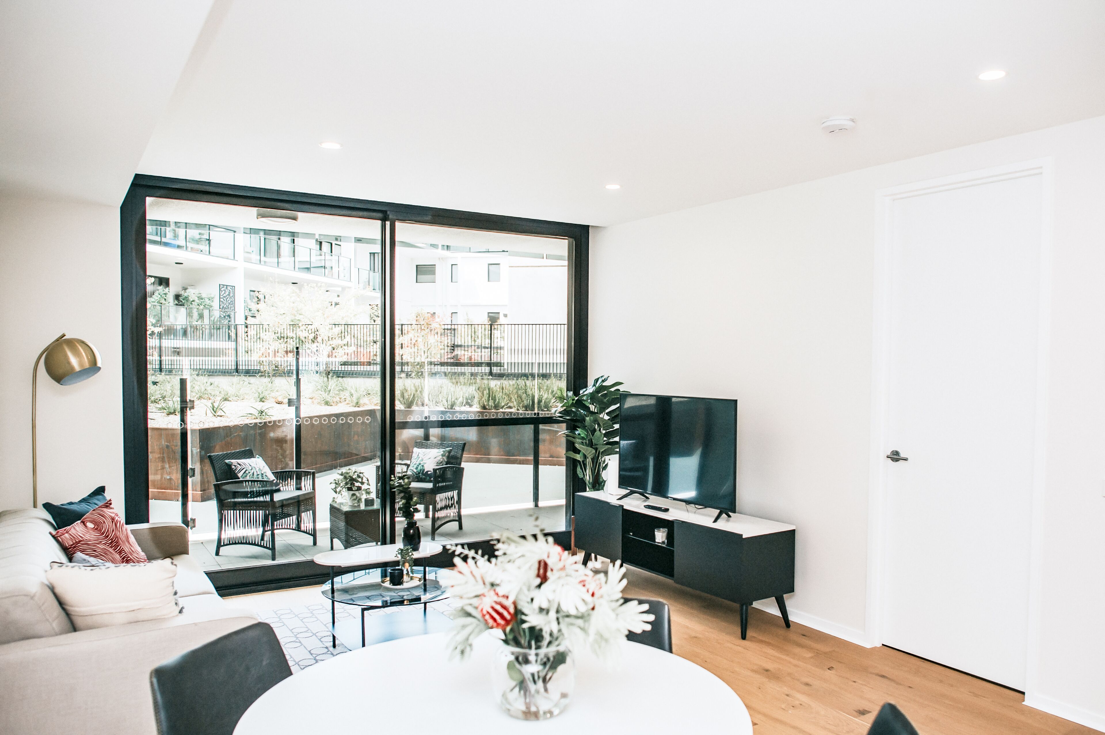 One Bedroom Apartment With Parking | Living area | 49-inch Smart TV with digital channels, TV