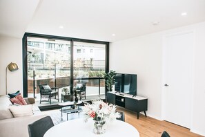 One Bedroom Apartment With Parking | Living area | 49-inch Smart TV with digital channels, TV - Kerridge St Apartments by Urban Rest (Kingston)