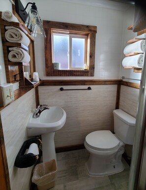 Shower, towels, soap, shampoo