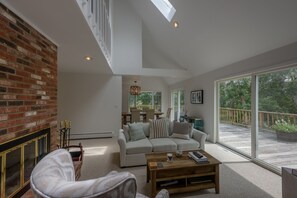 TV, fireplace, books