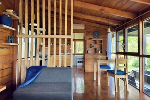 Fireplace, books - A Unique, Secluded Highland Cabin (bellavista)