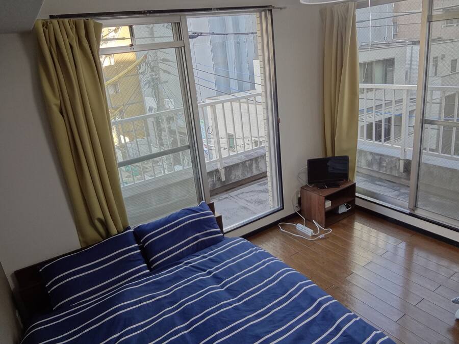 Standard Room (402) | Desk, laptop workspace, blackout curtains, iron/ironing board