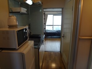 Standard Room with Loft (303) | Private kitchen | Fridge, microwave, stovetop, coffee/tea maker - Guest House Zen Hakata Nishijin (Fukuoka)