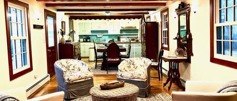 Smart TV, fireplace, books, offices